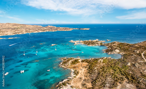 View from above, stunning aerial view of La Maddalena Archipelago with its turquoise, crystal clear bays of water. Caprera Island in the distance. Sardinia, Italy. photo