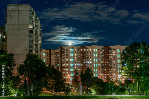 View of Moscow on the pond at moonlight night in Yasenevo district photo