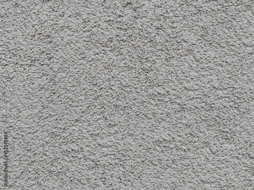 Blank light gray cement wall textured background, seamless texture