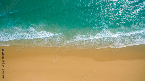 Top view aerial image from drone of an stunning beautiful sea landscape beach with turquoise water with copy space for your text. Beautiful Sand beach with turquoise water  aerial UAV drone shot