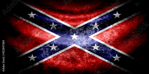 Battle wavy flag of Confederate in grunge style with darkened edges. Aged texture