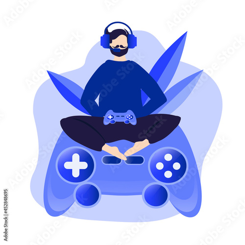 vector illustration on the theme of computer games, play station, game addiction. male character in headphones plays while sitting on a huge gamepad. trend illustration in flat style