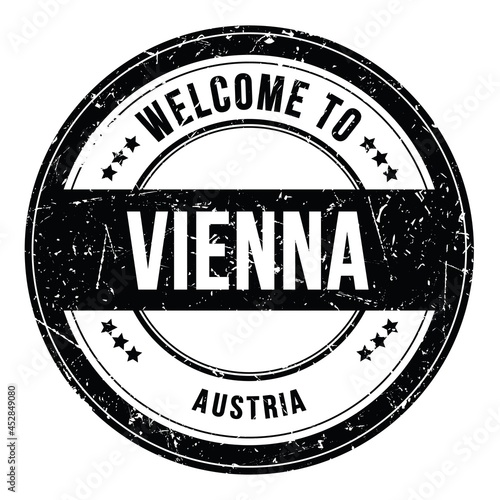 Photography WELCOME TO VIENNA - AUSTRIA, words written on black stamp