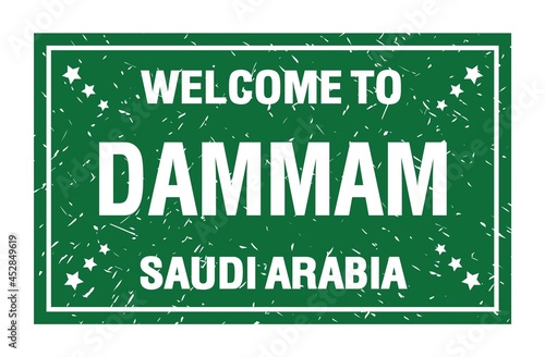 WELCOME TO DAMMAM - SAUDI ARABIA, words written on green rectangle stamp photo