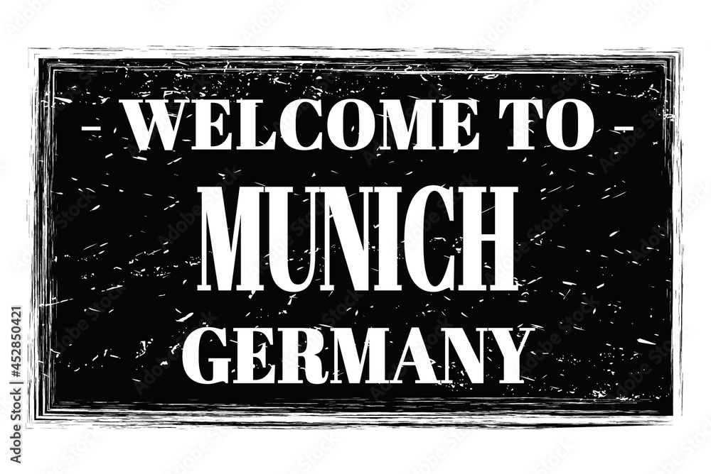 WELCOME TO MUNICH - GERMANY, words written on black stamp