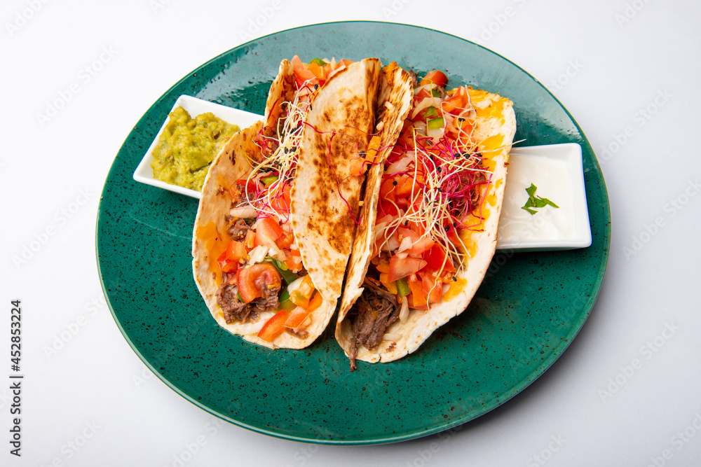 Mexican Taco with minced meat and vegetables Mexican Taco with minced meat and vegetables