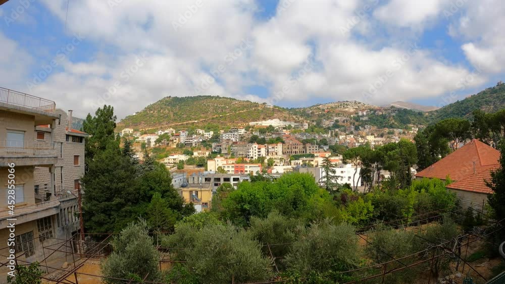 Beautiful city time lapse in cloudy weather. Village in summer season Beautiful city time lapse in cloudy weather. Village in summer season