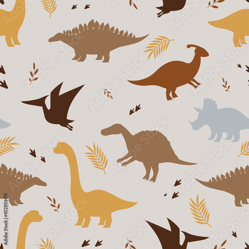 Seamless child dino pattern. Silhouettes of dinosaurs on a gray background. Backdrop for wallpaper  textile  fabric  wrapping