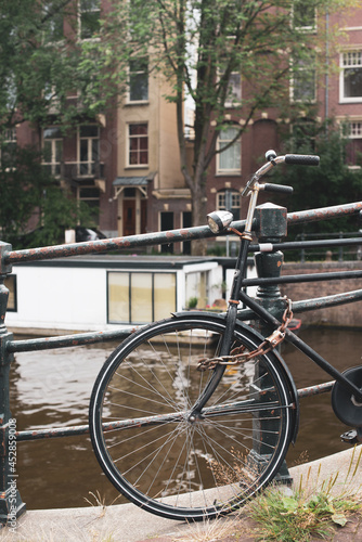 bicycle on the Amsterdam street © Alena Petrachkova