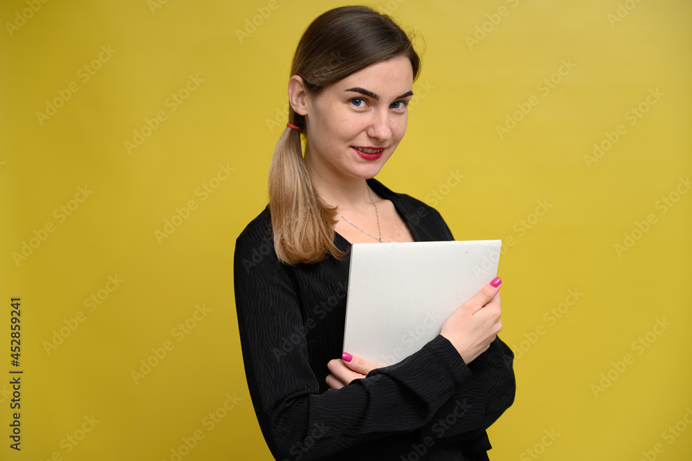 business girl portrait in studio on yellow background business girl portrait in studio on yellow background