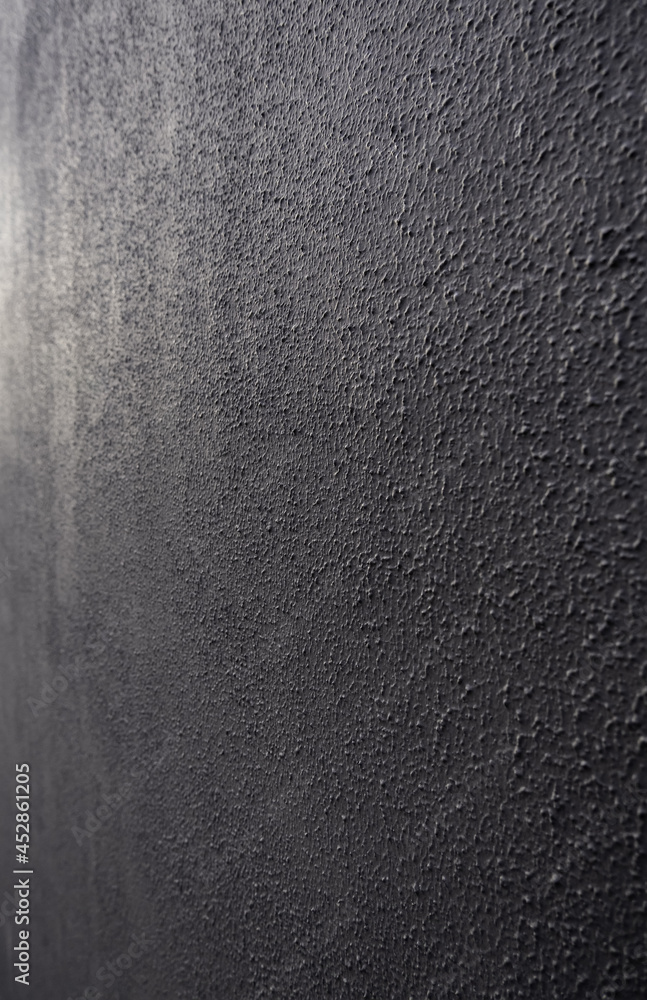 Rough black textured background Rough black textured background