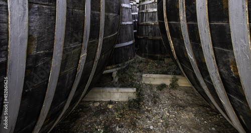 Old rusty wooden barrels