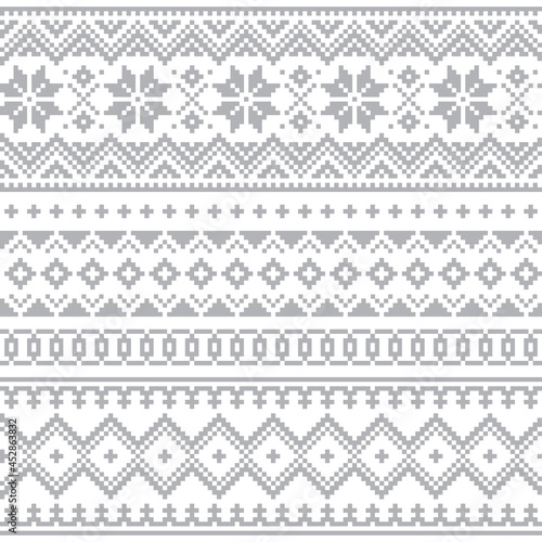 Christmas Lapland vector seamless winter pattern, Sami people folk art design, traditional knitting and embroidery in gray on white background 