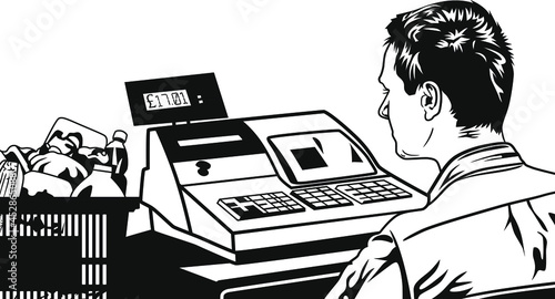 male cashier sitting at the cash register with lots of groceries beside him