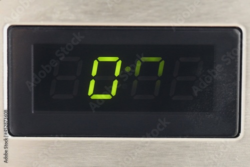 Closeup macro of numbers on a microwave