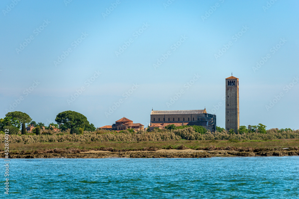 Torcello island, Basilica and Cathedral of Santa Maria Assunta in Venetian-Byzantine style (639) and the Church of Santa Fosca (IX-XII century), Venice lagoon, Veneto, Italy, Europe.