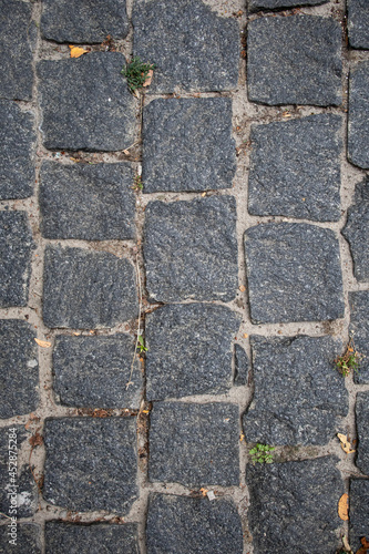 Old gray stone pavement texture pattern