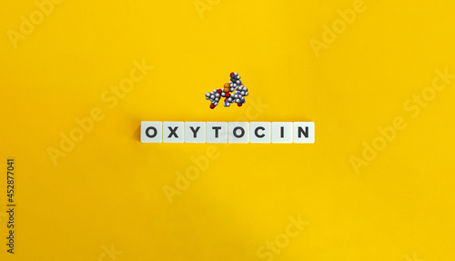 Oxytocin CPK 3D model banner and concept. Block letters on bright orange background. Minimal aesthetics. photo