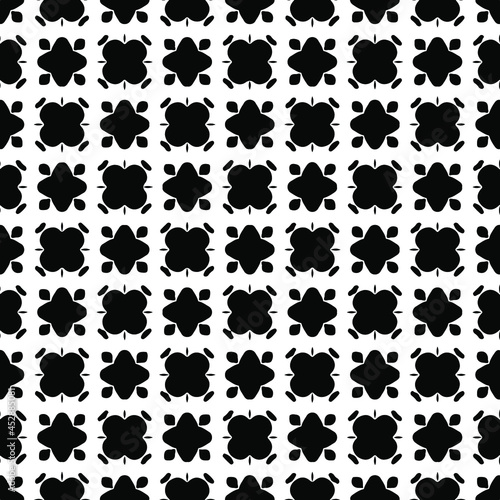 Flower geometric pattern. Seamless vector background. White and black ornament. Ornament for fabric, wallpaper, packaging.Decorative print 