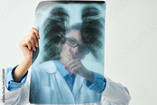 doctor in white coat with x-ray health care Studio