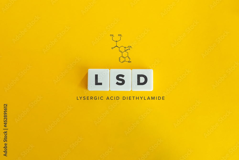 LSD (Lysergic acid diethylamide) banner and concept. Block letters on bright orange background. Minimal aesthetics. LSD (Lysergic acid diethylamide) banner and concept. Block letters on bright orange background. Minimal aesthetics.
