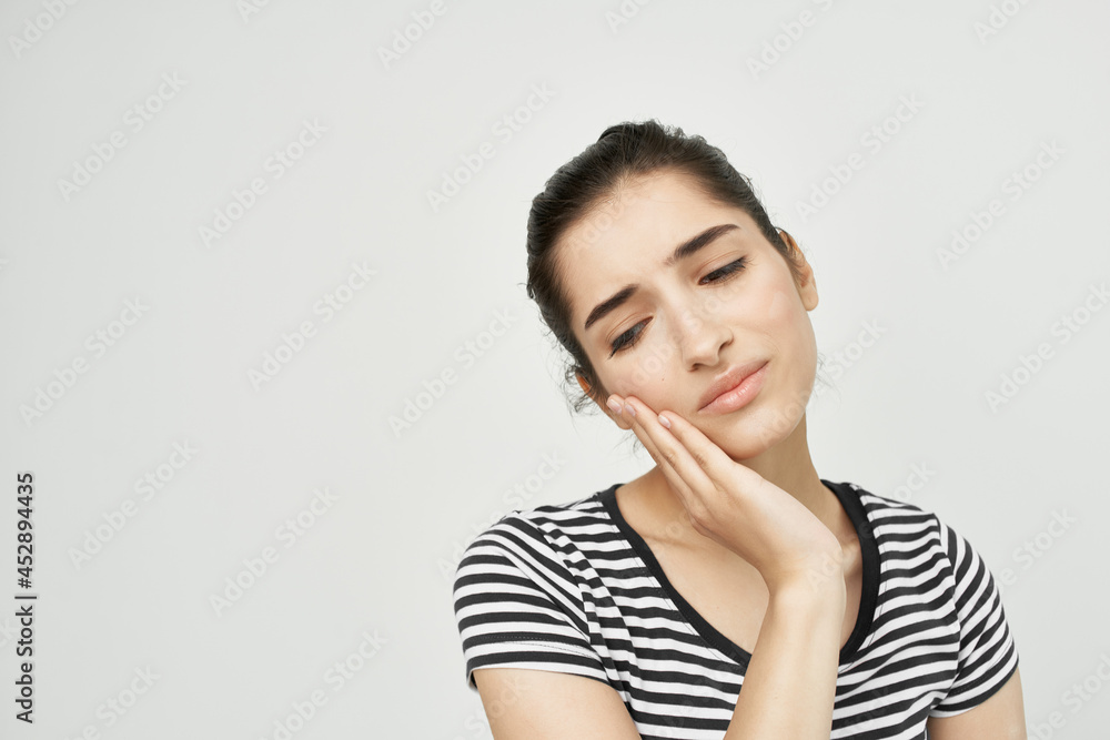 woman holding her head tooth pain dissatisfaction dentistry woman holding her head tooth pain dissatisfaction dentistry