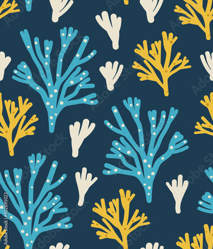 Seamless pattern of ocean corals and seaweeds, isolated on blue. Concept of ocean flora and fauna, marine and underwater life, summertime, underwater plants, ocean bottom.