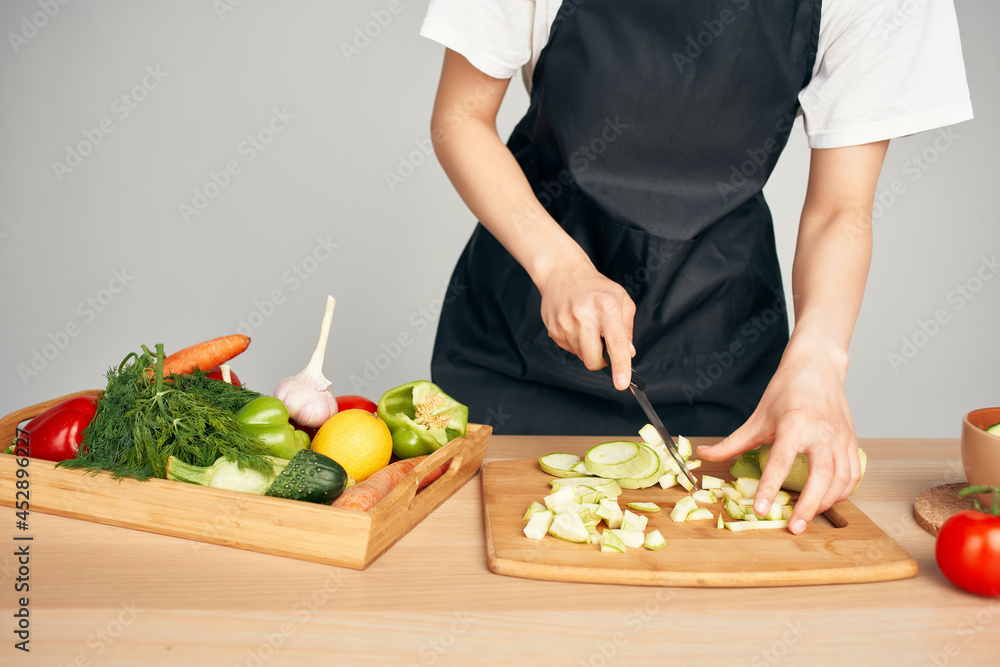 cutting vegetables in the kitchen cooking healthy eating close-up cutting vegetables in the kitchen cooking healthy eating close-up