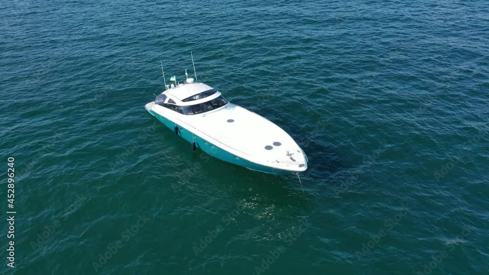 Luxury yacht among the sea. View from above. Shooting from a drone. Luxury yacht among the sea. View from above. Shooting from a drone.