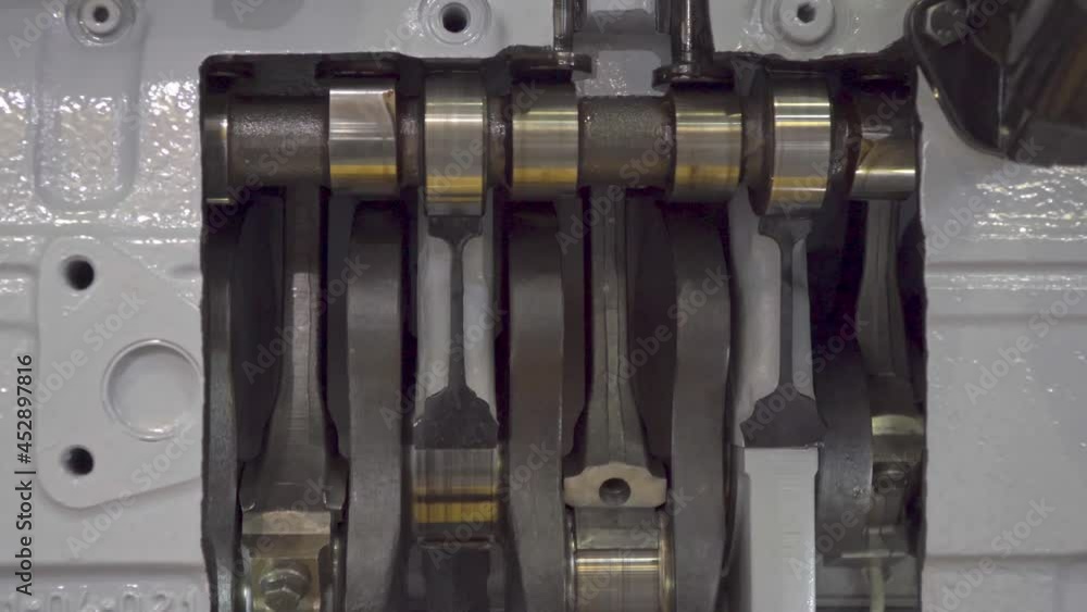 The structure and operation of the diesel engine of the truck in the context, close-up The structure and operation of the diesel engine of the truck in the context, close-up