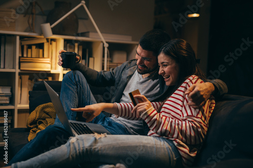 happy young couple enjoying time at home