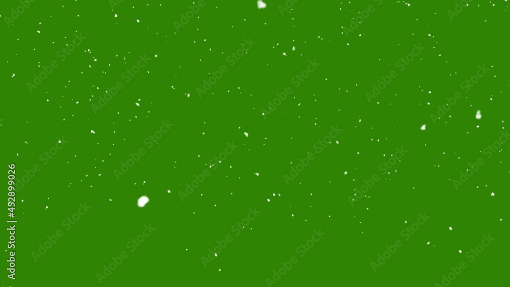 Snow falling on green background Snow falling on green background