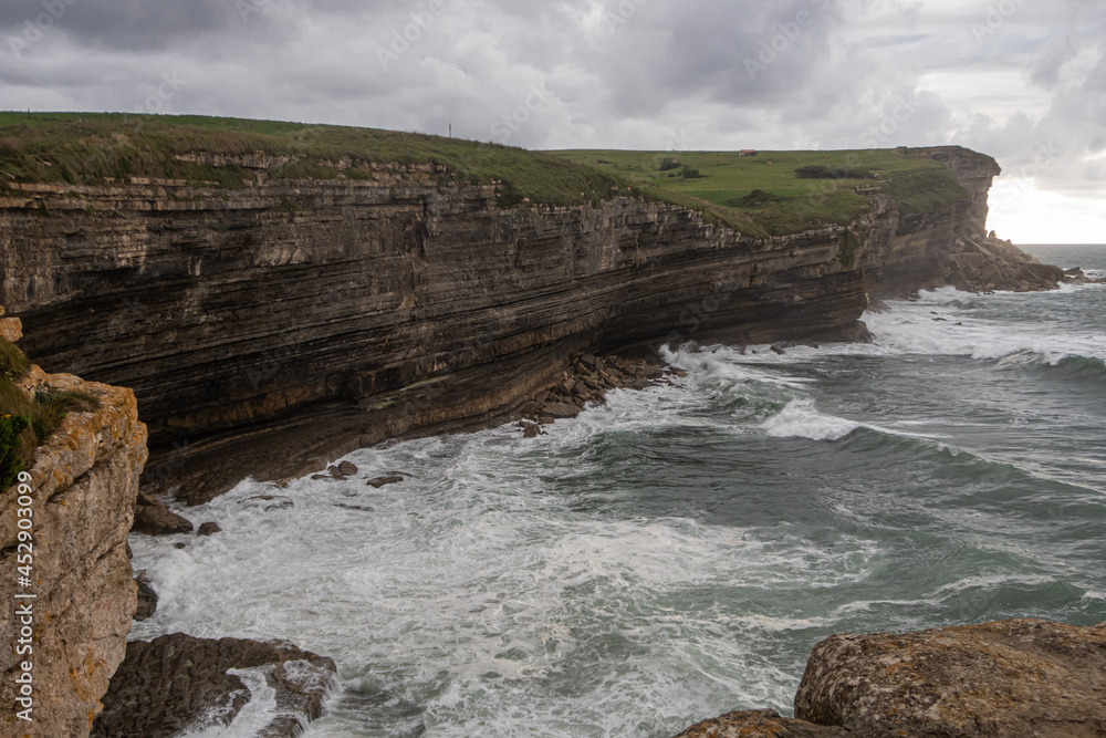 swell on the El Bolao cliff in Cantabria