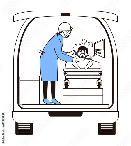 救急車の中で酸素投与する救急隊員と患者 photo