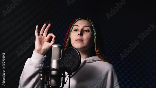 Wallpaper Mural Young woman with colored hair stands in a recording studio Torontodigital.ca