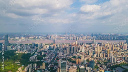 Wallpaper Mural Timelapse of Aerial view of Wuhan skyline and Yangtze river with supertall skyscraper under construction in Wuhan Hubei China. Torontodigital.ca