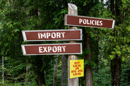 Import and Export. Policies and Buy Local concept. Direction arrows © STOATPHOTO