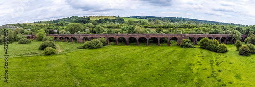 An aerial panorama view towards the Hockley viaduct at Winchester, UK in early summer