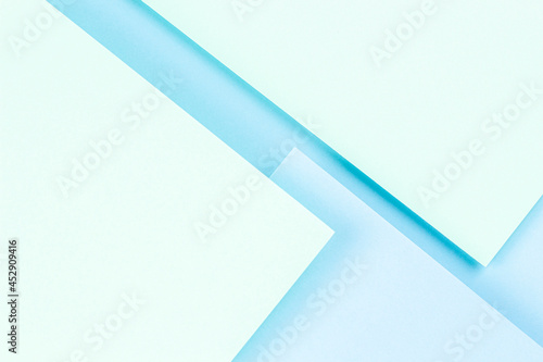 Free Download Abstract colored paper texture background. Minimal geometric shapes and lines in pastel green and light blue colours - GFXLoad