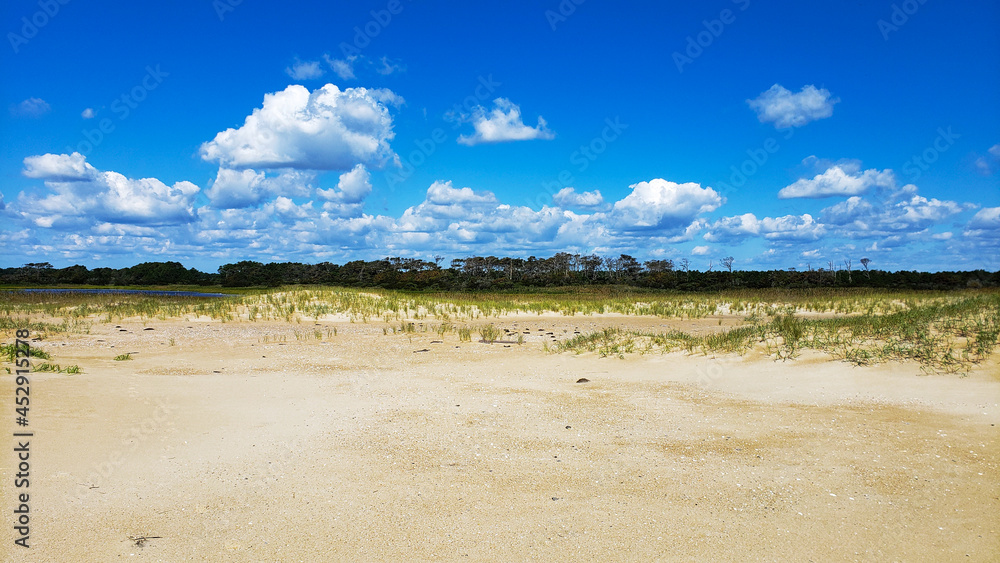 Blue sky with white clouds  and Sandy beach