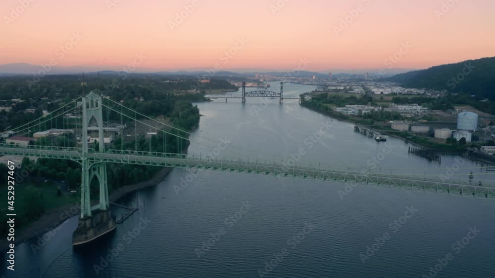 Aerial: Traffic on the St. Johns Bridge crossing the Willamette River, Portland, USA Aerial: Traffic on the St. Johns Bridge crossing the Willamette River, Portland, USA