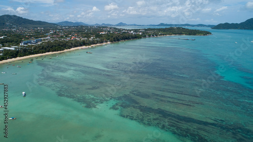 High angle view Tropical sea Beautiful seashore located in Phuket Thailand aerial view drone top down Amazing nature view landscape Beautiful sea surface in sunny day.