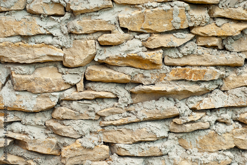 Texture of brick wall and concrete blocks. Samples of stone plates stacked evenly in a row. Texture of brick wall and concrete blocks. Samples of stone plates stacked evenly in a row.