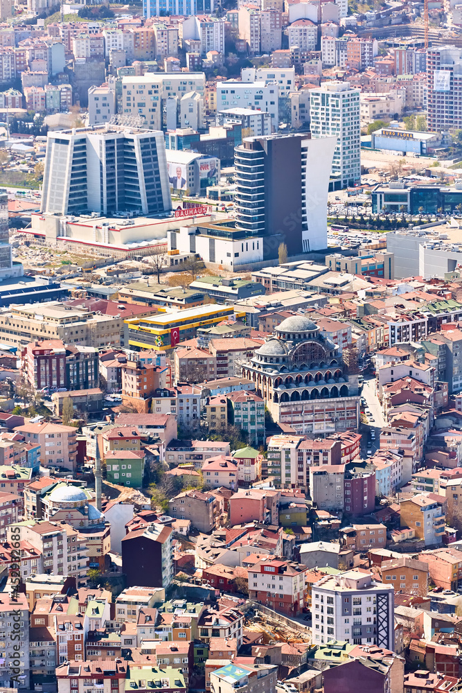 Obraz premium Istanbul, Turkey - April 3, 2017: View of the roofs of Istanbul. Retro style. Shooting through glass