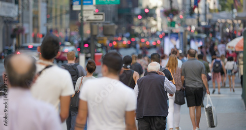 Crowd of people walking street in New York City © blvdone
