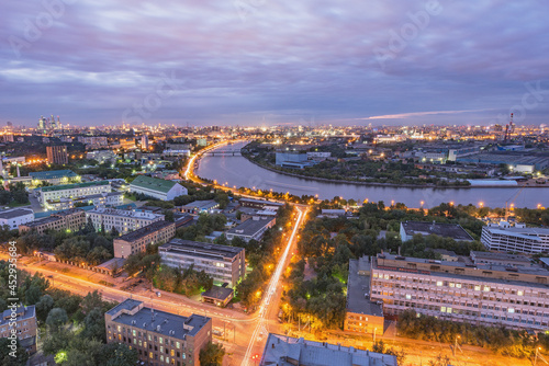 Aerial city view by the river at sunset. Moscow.