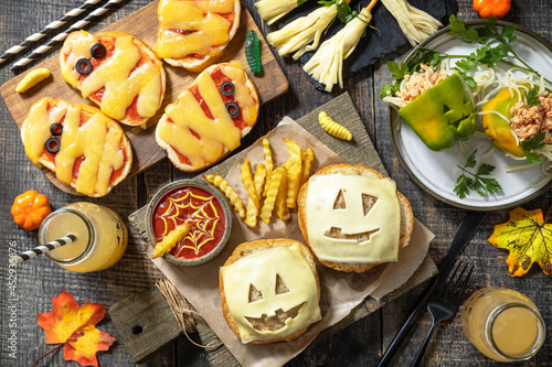 Photography Halloween party food corner table scene over a wood background