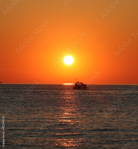 boat in the sunset © Kingshawk