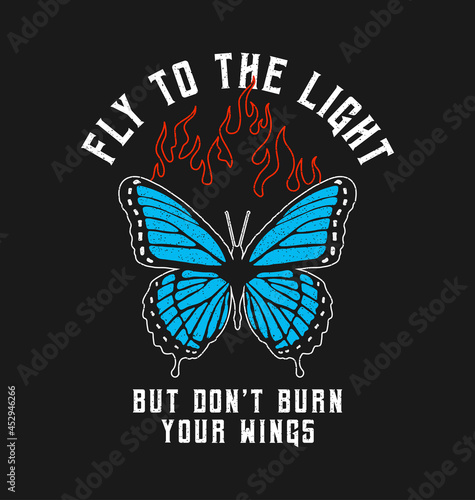 Butterfly print with blue wings and fire flame. T-shirt design with slogan text. Typography graphics for tee shirt with butterfly. Vector illustration.