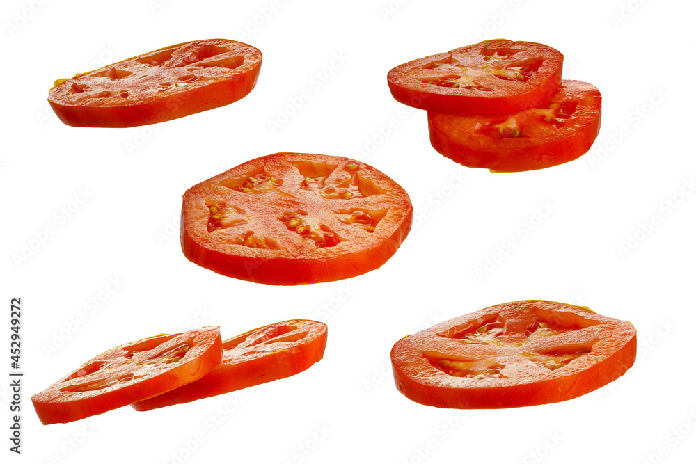Set of tomato slices isolated on the white background Set of tomato slices isolated on the white background